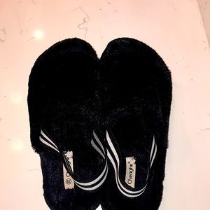 half an inch high slip on fluffy black shoes